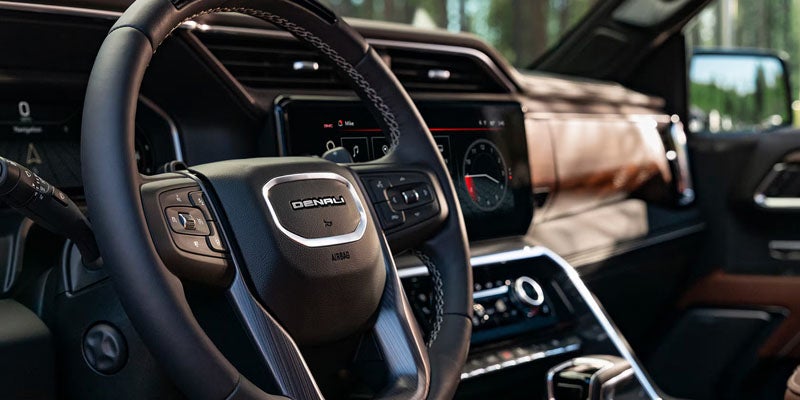 2026 GMC Sierra 1500 driver seat and digital dashboard